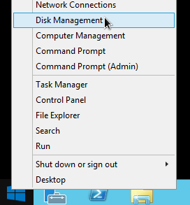 Selecting the Windows Disk Manager tool from the right-click menu on the Windows Start button.