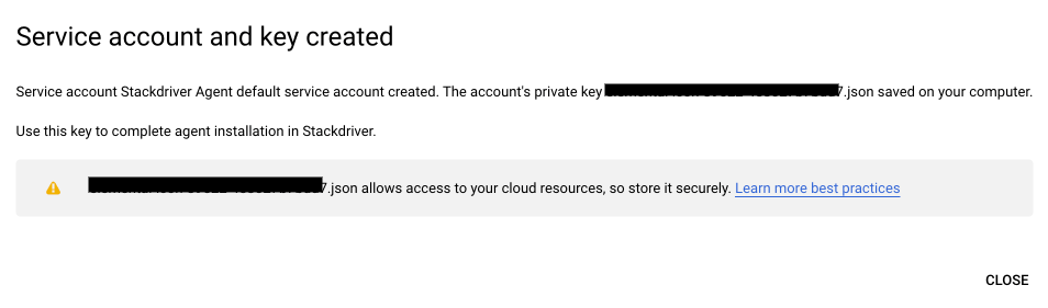 A banner notifying the user that a service account and key were created.