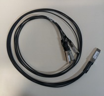 A photo depicting a QSFP+ to 4xSFP+ network cable